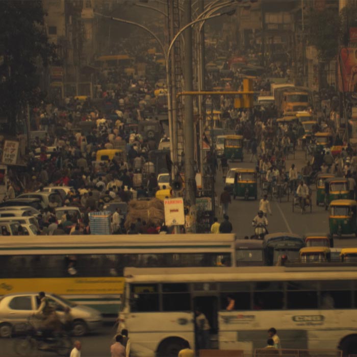 a hectic, busting city that's visually heavily polluted